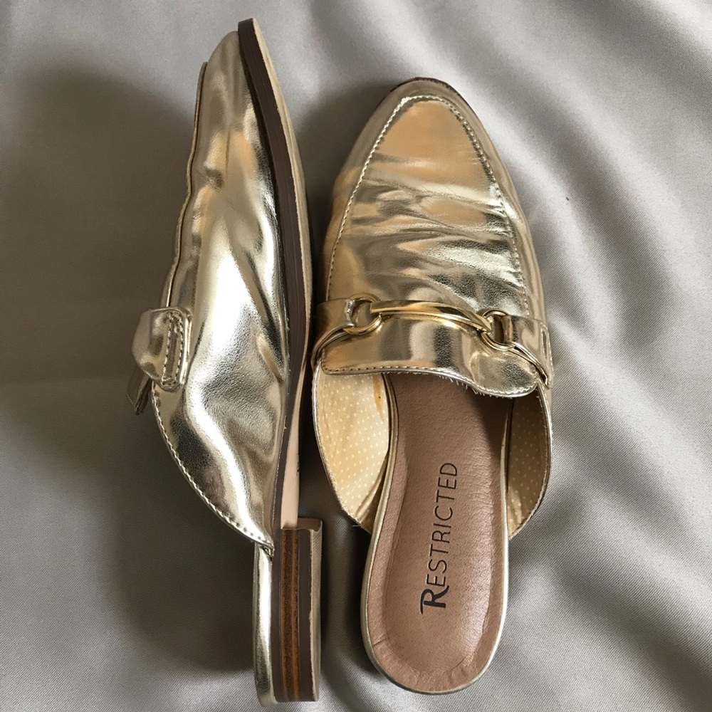 RESTRICTED gold slip on loafers